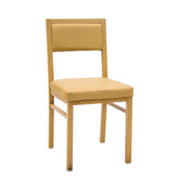 indoor metal chair in natural finish with natural vinyl seat back