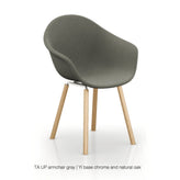 ta upholstered armchair with yi base