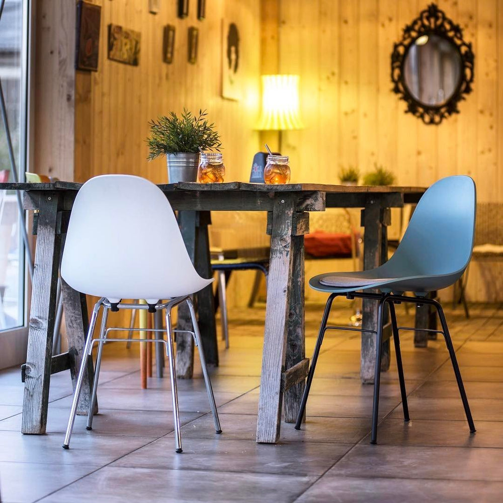 ta side chair with chrome plated er base and black seat