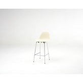 ta bar stool with black seat and chrome base