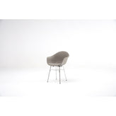 ta upholstered armchair with er base