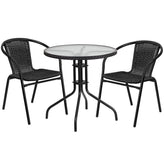 28 inch round glass metal table with black rattan edging and 2 black rattan stack chairs